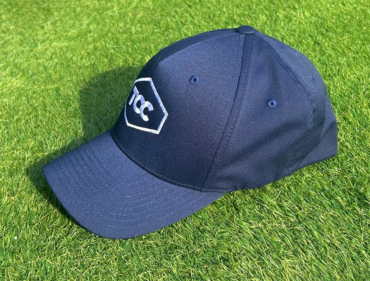 TCC Navy Cap side on view
