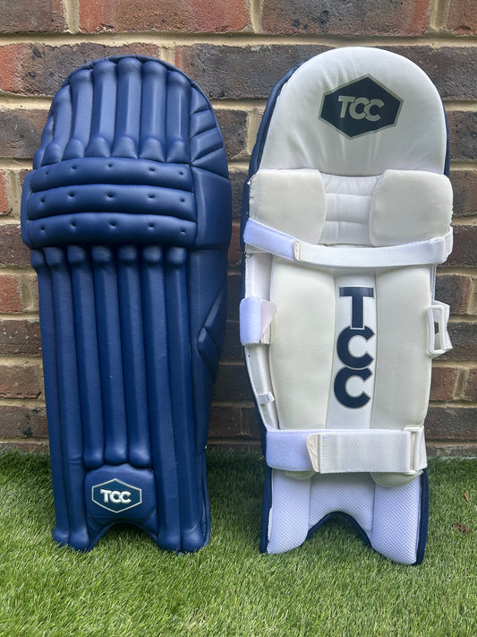 TCC Premium Navy Batting Pads with Navy Logo with front on and inside leg iew