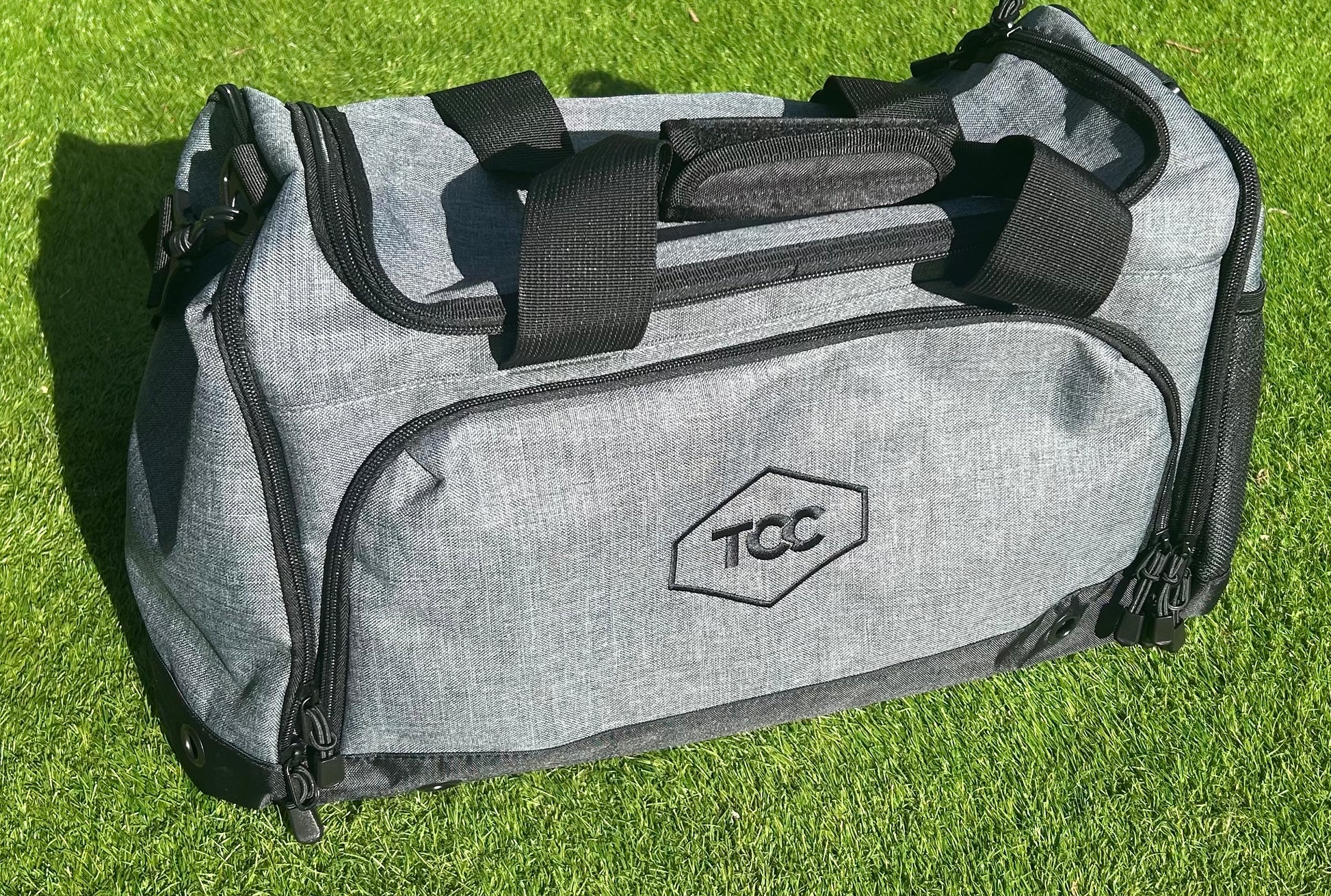 TCC Sports Holdall pictured on grass in Sunshine
