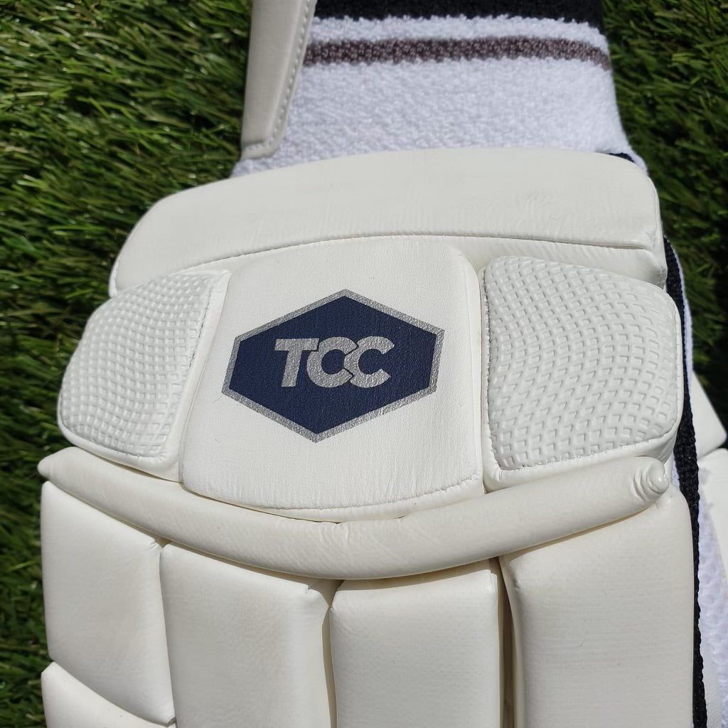 Zoomed in phot of the TCC logo on the back of the hand 