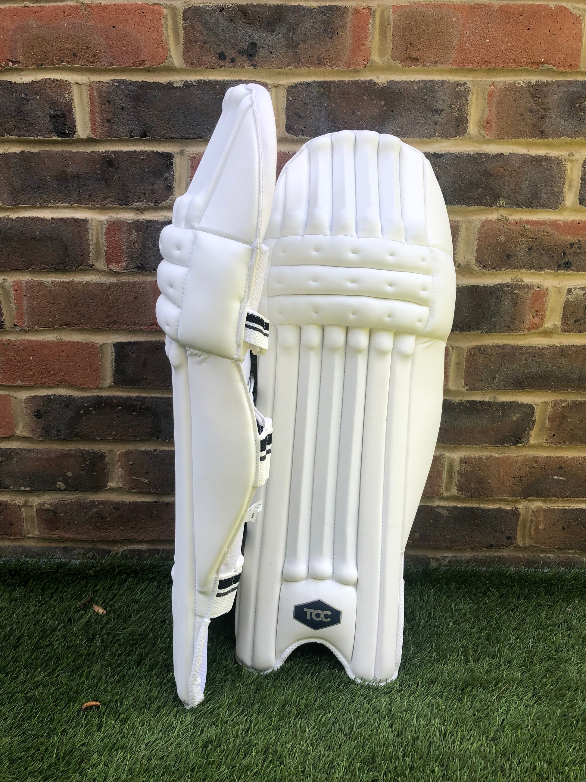 TCC Youth batting pads front and side profile view