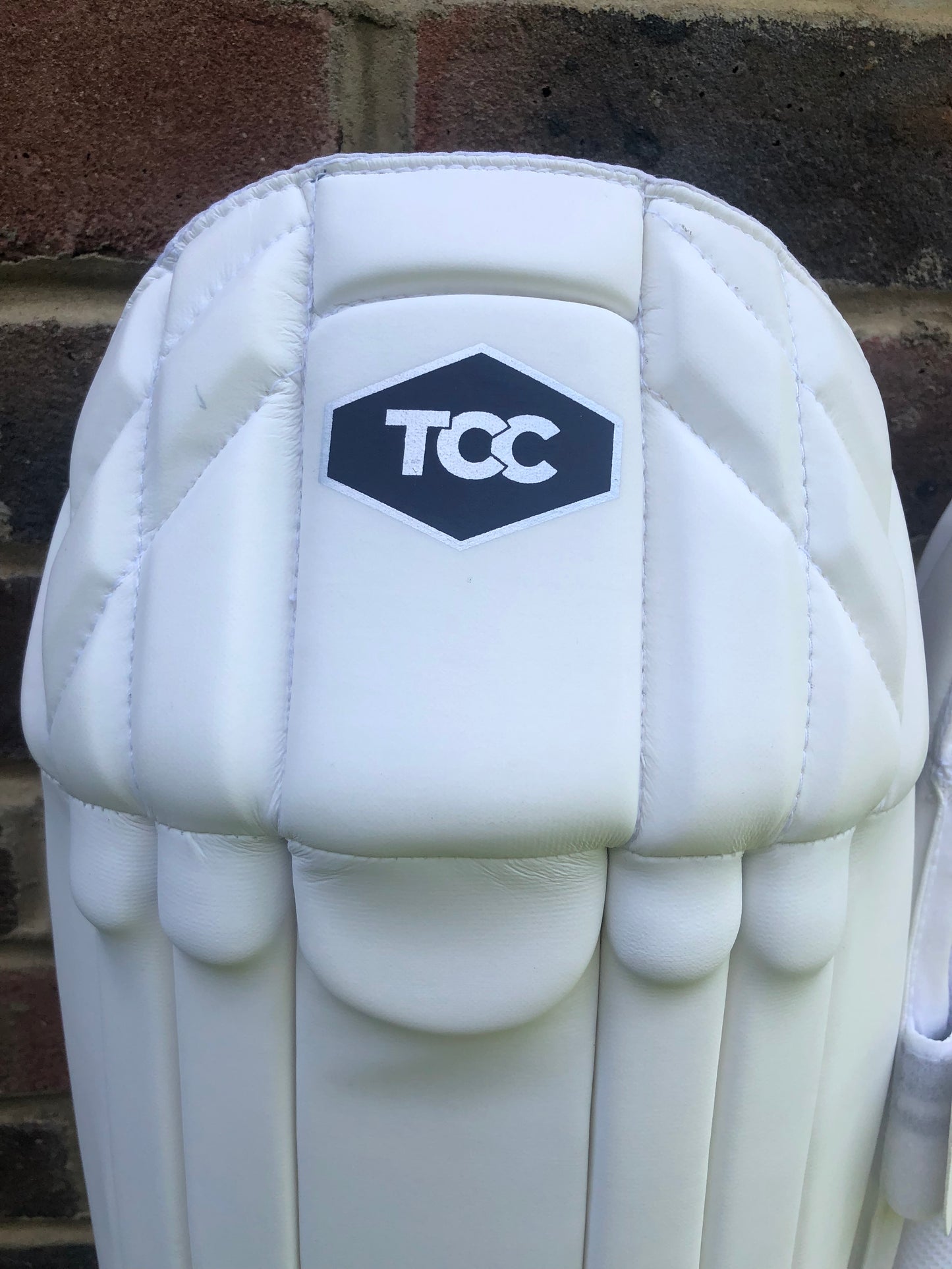 TCC Wicket keeping pad knee protection with TCC logo