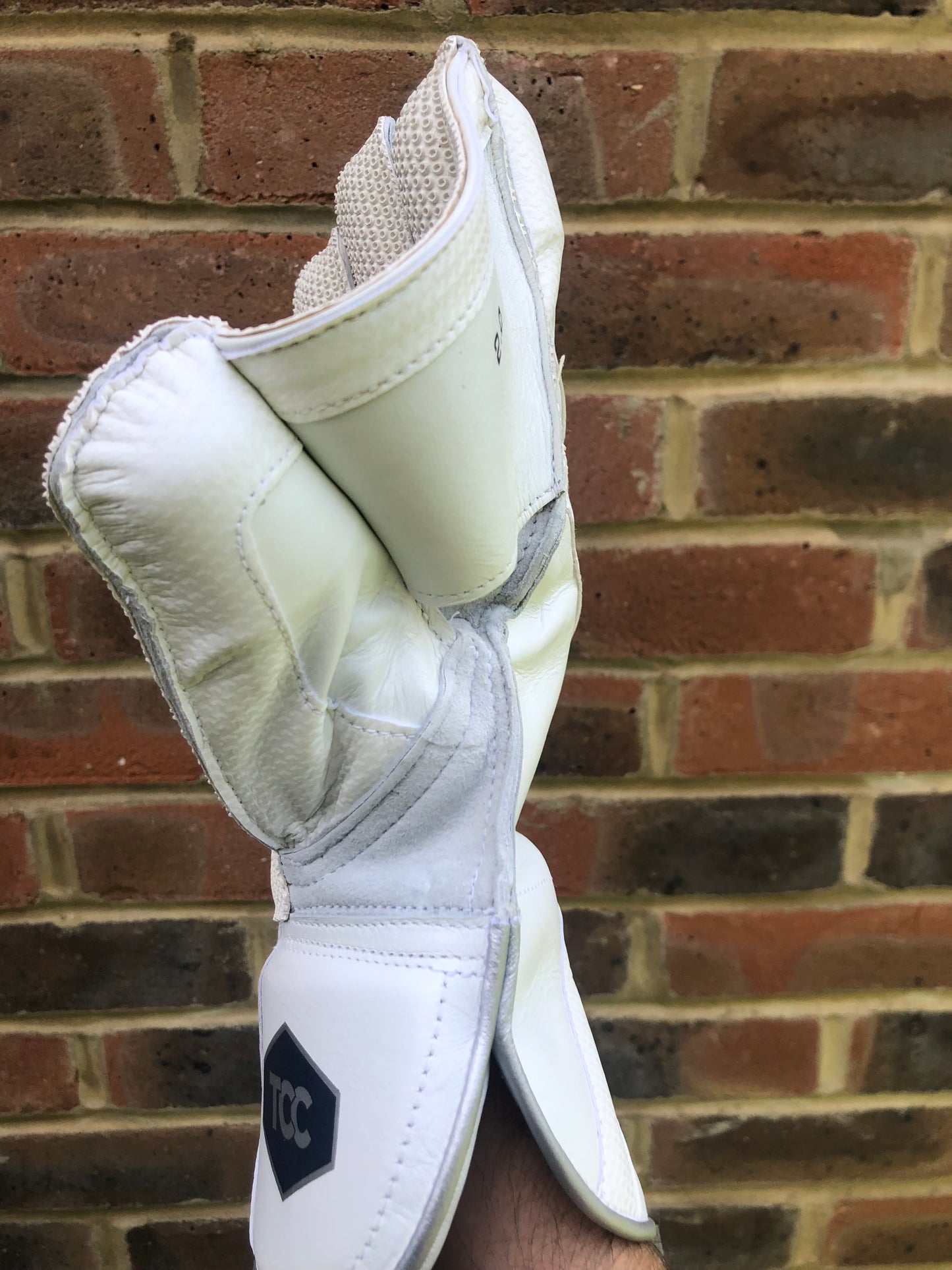 TCC Wicket keeping glove on side profile on right hand showing the thumb and finger protection