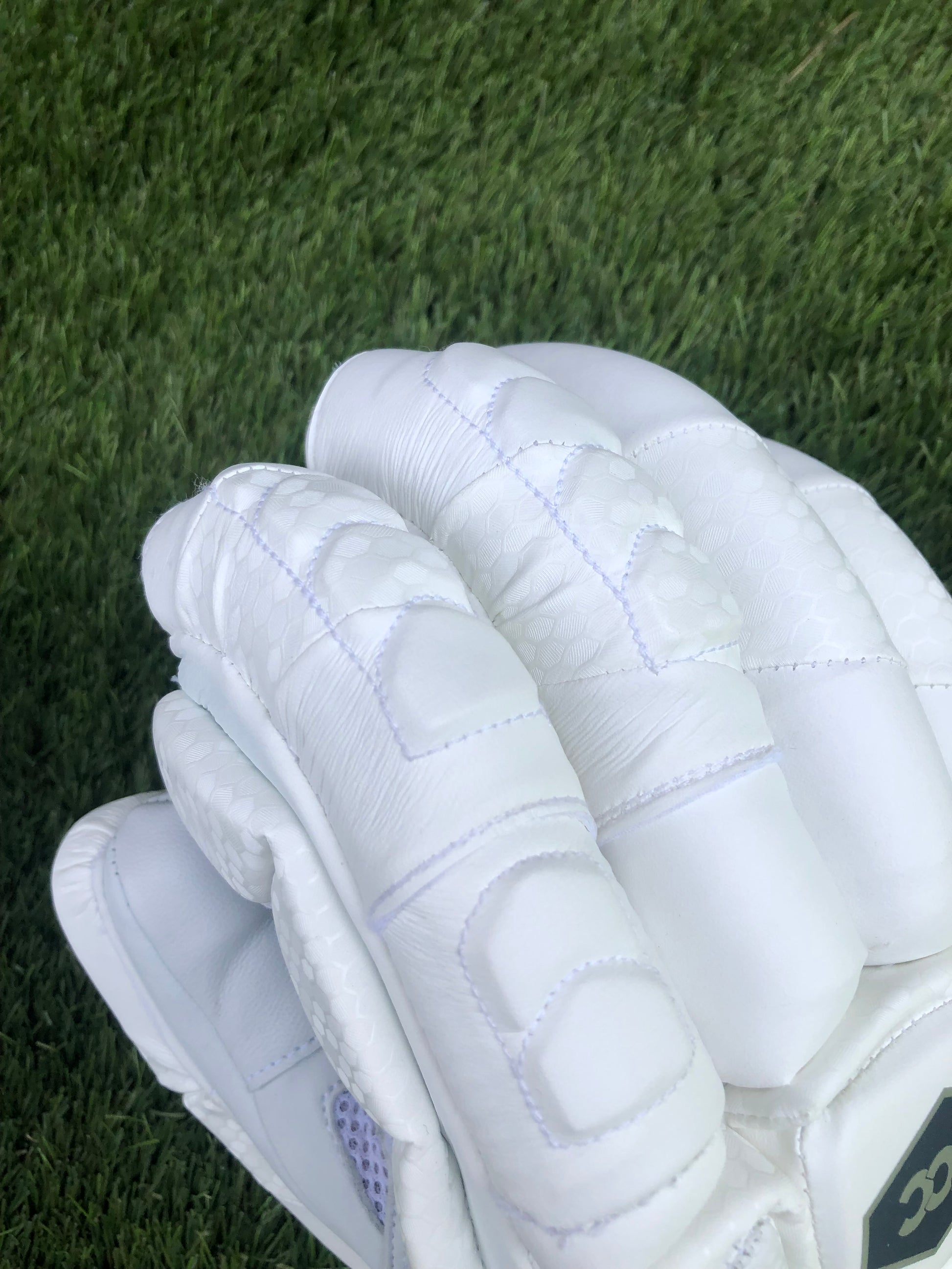 TCC 2.0 batting glove focussed on the extra finger protection