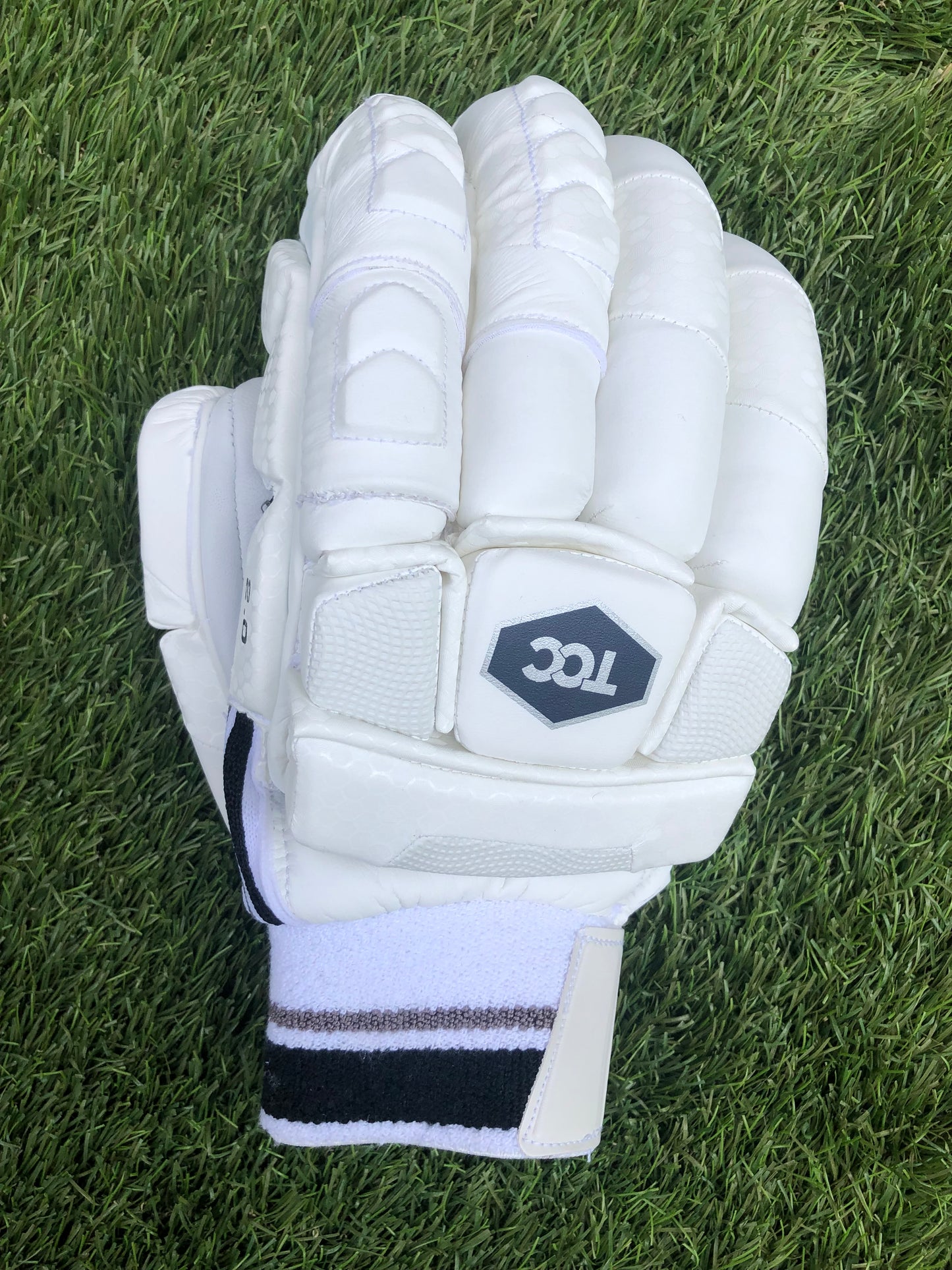 TCC 2.0 batting glove focussed on the back of the hand and showing the additional finger protection