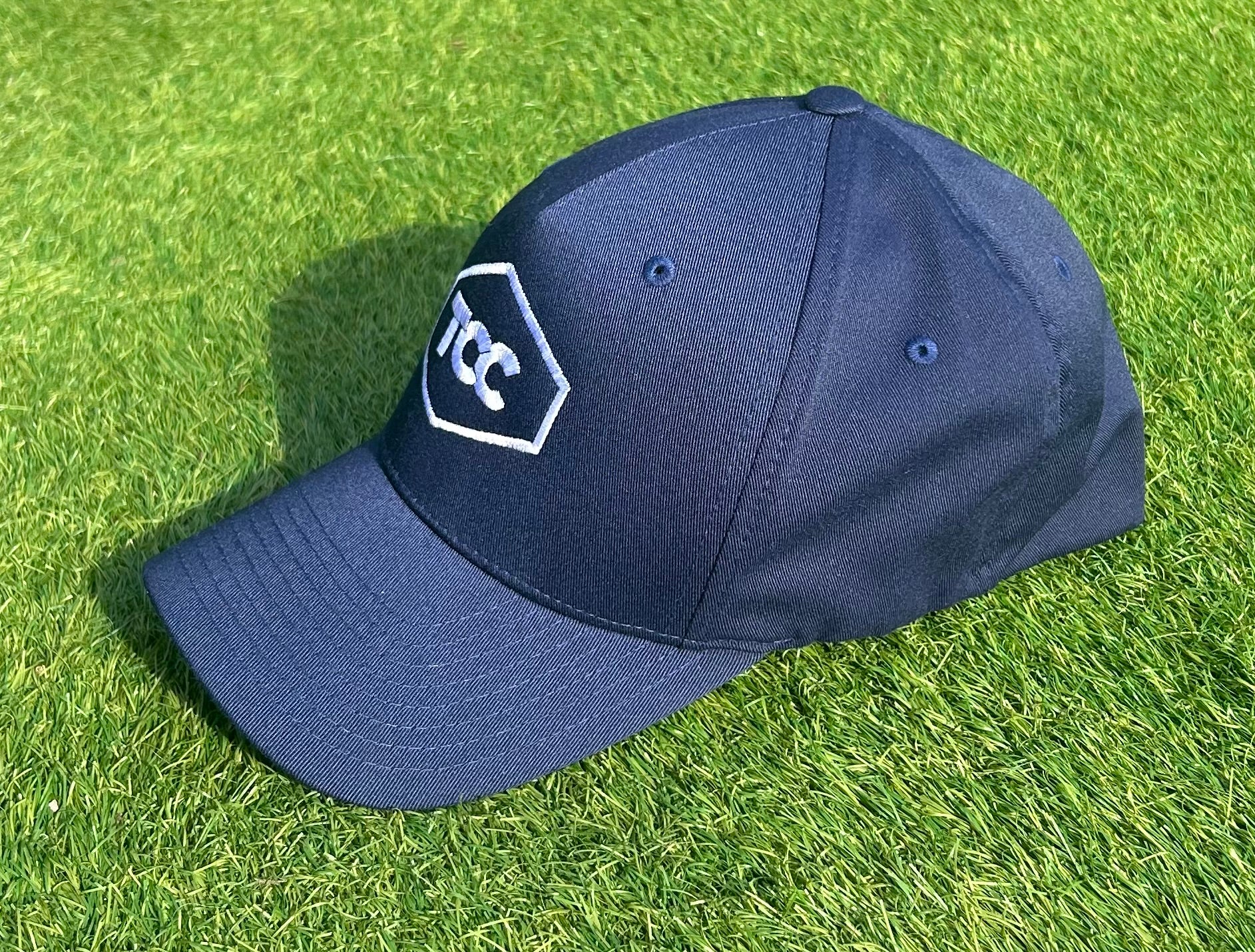 TCC Navy Cap side on view